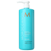 A imagem mostra o Shampoo Moroccanoil Extra Volume 1L. O frasco possui uma cor azul ciano vibrante, com letras em branco, preto e laranja. Também há informações de que é um produto para cabelos finos. Possui um dosador na parte superior.
