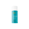 A imagem mostra o produto Moroccanoil Volume Thickening Lotion 100ml, em embalagem cilíndrica na cor turquesa com tampa branca. A embalagem traz o logotipo "M" em laranja e o texto "Thickening Lotion Volume" indicando que é um produto para dar volume.