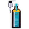 A imagem mostra o Óleo Capilar Moroccanoil Treatment Light 100ml, frasco na cor âmbar com rótulo azul turquesa, com detalhes em branco e laranja. Ao lado do produto está um aplicador dosador de plástico.