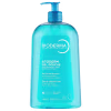 Frasco de gel de banho azul da marca Bioderma, com bomba doseadora, rótulo com nome do produto "Atoderm Gel Douche" e informações sobre pele normal a seca.