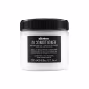 Frasco de condicionador Davines OI com 250 ml, embalagem branca e preta com rótulo destacando o nome do produto e a presença de óleo de roucou, indicado para todos os tipos de cabelo.