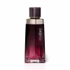 Frasco de item de perfumaria da marca Malbec, com formato retangular, em tons de marrom e vermelho, com rótulo dourado destacando o nome da marca.