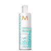 Frasco branco de condicionador Moroccanoil para realçar cachos, com rótulo em branco e laranja exibindo o nome da marca e a descrição "Curl Enhancing Conditioner".