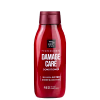 Frasco vermelho de condicionador da linha Damage Care da marca Mise en Scène, com rótulo preto destacando o nome do produto e a indicação de ser um condicionador de proteína.