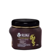 Pote de tratamento capilar Sillage com 300g, embalagem preta e dourada, com rótulo destacando os ingredientes Mandioca, Biotina e D-Pantenol, que fortalecem e promovem o crescimento saudável dos cabelos.