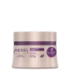 Máscara de tratamento capilar da linha Ametista da marca Haskell Cosméticos. A embalagem é um pote plástico de cor bege com detalhes em roxo, contendo 300g do produto.