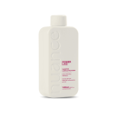 Shampoo da marca Nuance Professional, chamado "Power Liss". A embalagem é um frasco branco com o nome da marca e do produto destacados. O frasco possui um formato cilíndrico e contém 1L