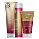 A imagem mostra produtos da linha K-PAK Color Therapy da marca Joico: shampoo de 300ml, condicionador de 250ml e máscara de 150ml