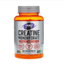 Este é um suplemento alimentar de creatina monoidratada da marca Now Sports. O produto vem em uma embalagem plástica laranja transparente. O rótulo destaca o nome "Creatine Monohydrate", "Mass Building" e "Energy Production".