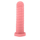 Sex toy. Plug anal em formato cônico, lembrando um parafuso, na cor rosa. Tem as dimensões 14,5 x 3,5cm