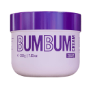Pote de creme cosmético de 200g com rótulo roxo e branco exibindo a marca "BUMBUM" em letras grandes. O produto é descrito como "Suave" no rótulo.