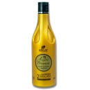 Máscara capilar da linha Argila Branca da marca Adlux Cosméticos. A embalagem é um frasco cor amarela com detalhes em preto, contendo 500ml. O rótulo destaca o nome "Argila Branca" e menciona que o produto é indicado para "Cachos Definidos e Saudáveis"