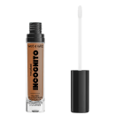 A imagem mostra um corretivo líquido da marca de cosméticos Wet n Wild chamado "Incognito". O produto é descrito como "Cobertura Total o Dia Todo" e apresenta um aplicador em forma de pincel integrado à embalagem.