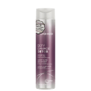 Shampoo detox Defy Damage da marca Joico. Embalagem cilíndrica roxa com detalhes prateados. Rótulo indicando que remove metais, minerais traço e cloro dos cabelos. Volume de 10.1 fl oz / 300ml.