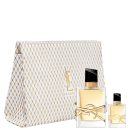 A imagem mostra o conjunto de produtos da linha Libre de Yves Saint Laurent. Mostra os frascos do perfume nas volumetrias de 50ml e 7,5ml e uma nécessaire luxuosa branca com detalhes rendados dourados e o monogramda da marca no centro.