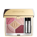 Embalagem dourada com o logotipo "Dior" em relevo. Interior contém quatro sombras prensadas em tons de rosa e marrom, uma sombra brilhante dourada no centro e dois aplicadores de sombra.