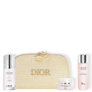 Nécessaire dourada com a palavra "Dior" na frente. Uma loção facial em formato cilíndrico na cor rosa claro e tampa dourada.  m sérum redutor de linhas em embalagem cilíndrica prateada. Pote de creme redutor de linhas redondo nas cores prateada e branco.