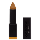 A imagem mostra a Base em Bastão Océane Edition Foundation Stick: embalagem preta retangular com o logotipo "Océane Edition" impresso em relevo na parte frontal. A base tem formato triangular.