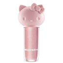 Maquiagem em formato cilíndrico com a cabeça da personagem Hello Kitty como tampa. A parte superior é rosa com detalhes em relevo que representam os olhos, orelhas e laço da Hello Kitty. É possível ver a cor do produto pelo corpo transparente.