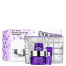 A imagem mostra um kit com três produtos para a pele com embalagens de cor roxa, além de um nécessaire prata e uma caixa colorida ao fundo.