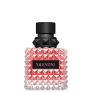 Frasco de perfume Valentino com design geométrico em vidro rosa e detalhes em preto, contendo o nome da marca em destaque.