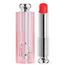 Possui uma embalagem rosa clara com detalhes prateados, incluindo o logotipo da marca.