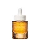 Frasco de vidro com conta-gotas contendo um sérum de ativador de juventude da marca Korres, com rótulo em amarelo e branco indicando "6xHA Wrinkle Smoothing Youth Activator Booster".