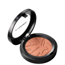 Compacto de maquiagem em tom bronze, com acabamento brilhante, em embalagem preta redonda com logotipo da marca. Produto de beleza com textura aveludada e design elegante.
