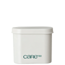 Recipiente branco cilíndrico com tampa, contendo produto de beleza da marca Care. O rótulo verde apresenta o nome da marca e a descrição "natural beauty".