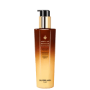 Frasco de leave-in Abeille Royale da Guerlain, com embalagem em tons de marrom e dourado, contendo um produto para cuidados com o couro cabeludo e cabelos.