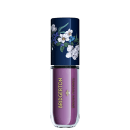 Blush Líquido BT x Bridgerton da marca Bruna Tavares com design floral, tampa em tons de azul escuro e líquido lilás. O rótulo apresenta o nome da marca Bruna Tavares e Bridgerton em letras douradas.