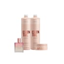 Dois frascos de shampoo Braé Essential, um frasco de perfume Bloom Rose da Braé e um pote de máscara capilar Braé Essential, em embalagens rosadas com detalhes em dourado e texto em vermelho.