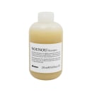 Frasco de shampoo Nounou da marca Davines, com 250 ml de capacidade. O produto apresenta um gradiente de cor do branco ao amarelo, com rótulo branco contendo o nome do produto em destaque.