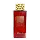 Frasco de perfume Zakat Crystal Carnate, com tampa dourada em formato geométrico e rótulo vermelho com detalhes dourados, apresentando uma fragrância exclusiva da marca.