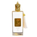 Frasco de perfume dourado e transparente da marca Zakat, com rótulo em árabe e inglês indicando o nome "Al Awwal". O frasco possui um design ornamentado e uma tampa dourada com detalhes decorativos.