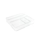 Caixa acrílica transparente com divisórias internas, ideal para organizar e exibir produtos de beleza, cosméticos ou acessórios em um ambiente limpo e minimalista.