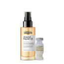 O produto é um óleo reparador da linha Serie Expert da L'Oréal Professionnel, com embalagem em frasco de vidro transparente e tampa preta. O rótulo apresenta o nome "Absolut Repair Oil" e informações sobre o produto.