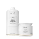 Dois produtos da linha Keune Care Satin Oil: um frasco de shampoo  de 1000 ml e um pote de máscara de 200 ml, ambos em embalagens brancas com detalhes dourados.