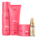 Produtos da linha Wella Professionals Color Brilliance, incluindo shampoo, condicionador e tratamento intensivo para cabelos coloridos, em embalagens rosa e douradas com o logo da marca.