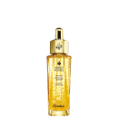 A imagem mostra o frasco do óleo hidratante Abeille Royale da Guerlain. É um frasco de vidro transparente contendo um líquido dourado brilhante, tem um formato cilíndrico alongado com uma tampa dourada na parte superior, com uma abelha estampada.