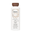 Frasco branco de shampoo da linha Match., com rótulo destacando a "Ciência das Curvas" e ingredientes à base de óleos africanos e blend hidratante molecular. Embalagem com tampa marrom e informações sobre o produto em português.