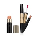 Conjunto de produtos de maquiagem da marca Eudora Glam, incluindo um iluminador em bastão e um batom na cor avelã