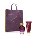 Conjunto de produtos da linha Royal da Eudora, composto por um frasco de desodorante colônia e um tubo de loção, com uma sacola da marca em tons de roxo e dourado.