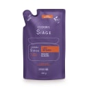 Embalagem flexível como um pacote de plástico roxa com detalhes em laranja e branco e indicação de lugar para cortar com tesoura. No centro, um desenho da silhueta do pote original contém as informações do rótulo do refil em letras brancas.