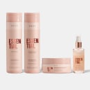 A imagem mostra produtos da linha Essential da marca Braé. Há dois frascos altos e cilíndricos de shampoo e condicionador. Um frasco menor de óleo capilar na mesma tonalidade rosa clara. E um pote de máscara capilar na cor rosa escuro.
