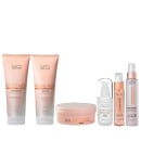 Conjunto de produtos de cuidados capilares da marca K.pro, incluindo shampoo, condicionador, máscara, óleo e leave-in em embalagens de plástico nas cores rosa e branco. Também conta com tubo de leave-in Molecular Repair Regenér K21 Bonds.