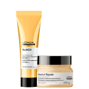 A imagem mostra um tubo com leave-in e um pote com máscara capilar, ambos da linha L'Oréal Professionnel Paris. O leave-in possui um tubo bege/dourado de 150ml com tampa preta. Já a máscara capilar possui um pote de 250g, bege com a tampa preta.