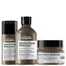 A imagem mostra três produtos da linha Absolut Repair Molecular da L'Oréal Professionnel. Um frasco marrom contendo shampoo de 300ml. Uma máscara em um pote plástico marrom de 250ml. E uma máscara de tratamento sem enxágue em um frasco marrom de 100ml.