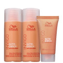A imagem mostra o Kit Wella Nutri-Enrich com dois shampoos de 50ml, e uma máscara de 30ml. Os produtos apresentam o logotipo da Wella com perfil estilizado de uma mulher com cabelos esvoaçantes e as cores predominantes são laranja e branco.