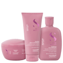 A imagem mostra uma linha de produtos de cuidados capilares da marca Alfaparf Milano, incluindo um frasco de shampoo, um frasco de leave-in e um pote de máscara capilar.